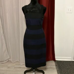 A beautiful black and navy blue dress.